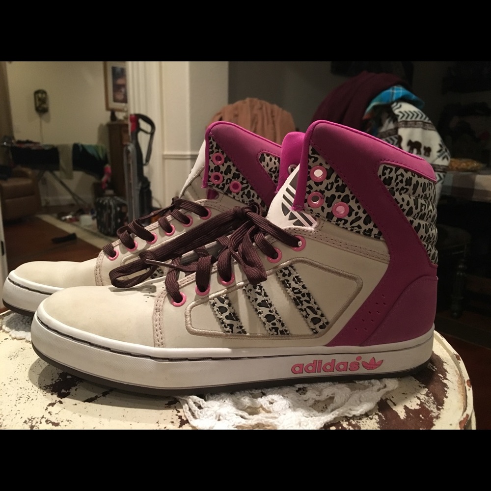 Adidas high tops in animal print. Well loved.